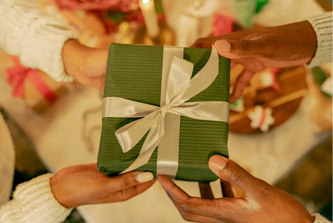 Hands holding a gift